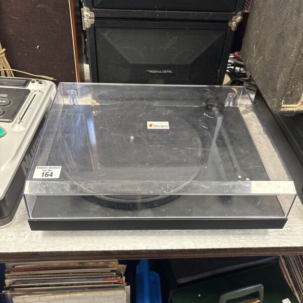 Black Pro-Ject Primary E belt-drive turntable for vinyl playback.