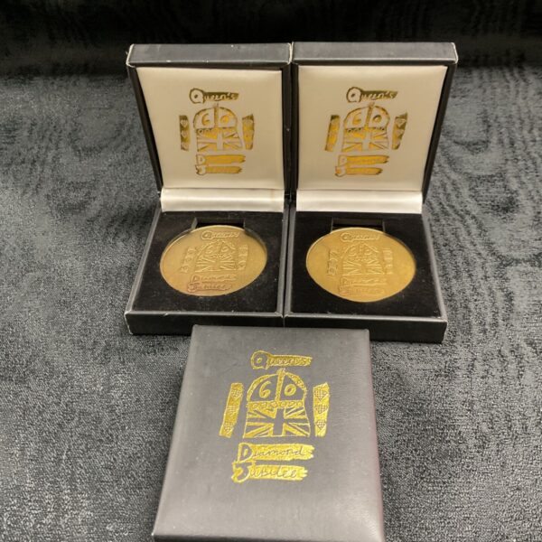Queens Diamond Jubilee medallions in presentation boxes, Stoke Mandeville 2012.