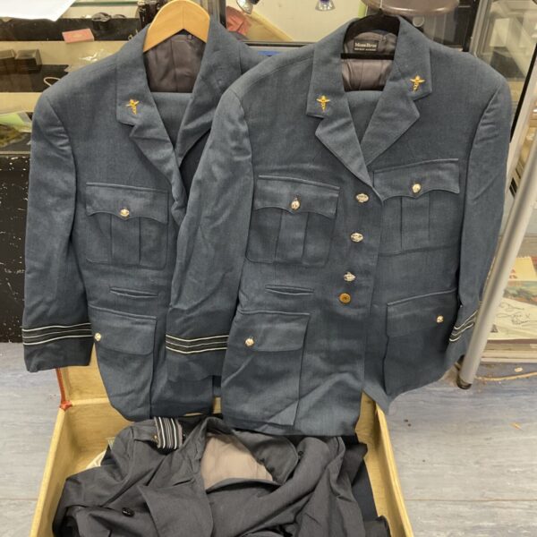 Vintage RAF Squadron Leader uniforms in a suitcase.