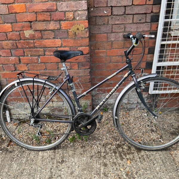 Grey Raleigh Pioneer bicycle with step-through frame.