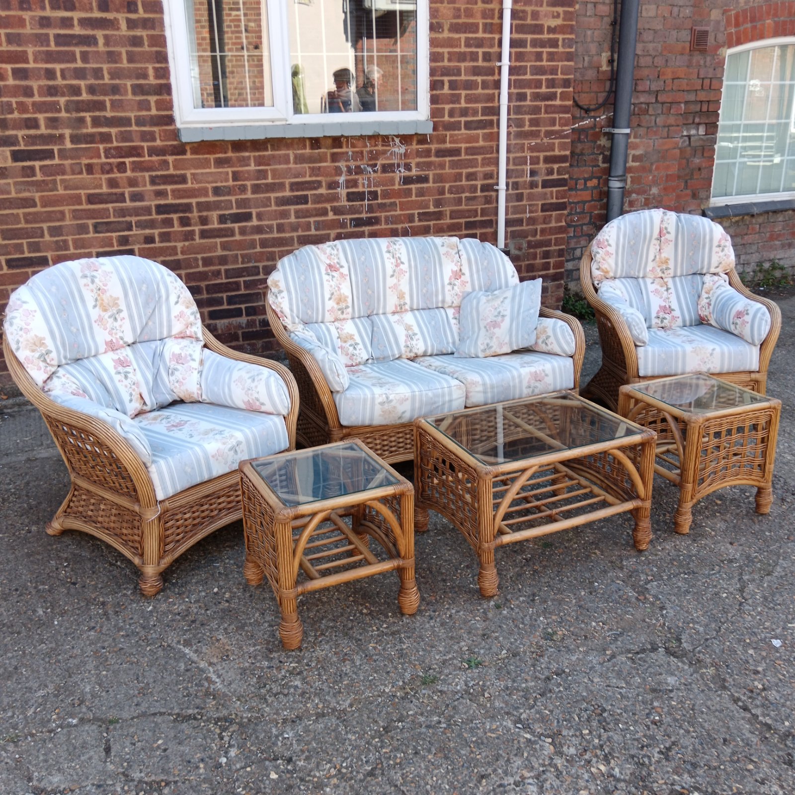 Complete Dano rattan conservatory set with sofa, chairs and tables.