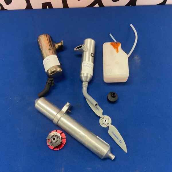 RC plane exhausts, fuel tank, and propeller for model airplanes.