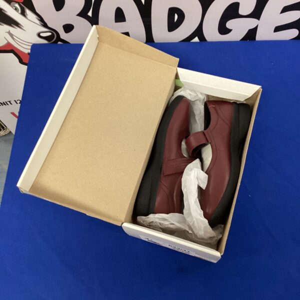 Cherry red padded shoes size 4.5 with velcro straps.