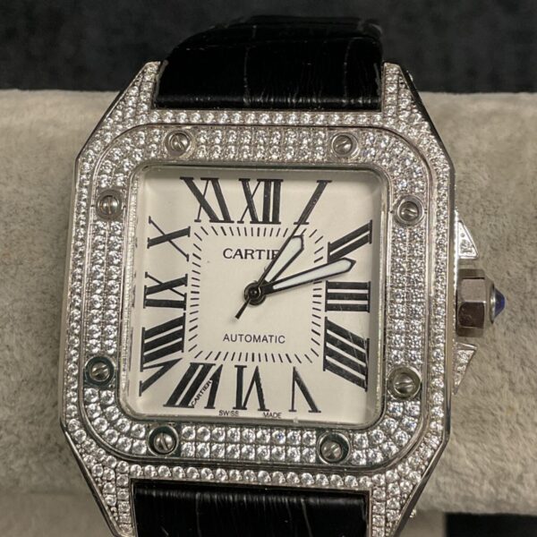 Replica Cartier wristwatch with diamond detailing and leather strap.