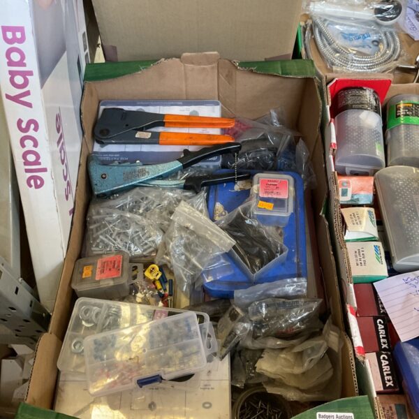Box of rivet guns, rivets, washers and electrical terminals.