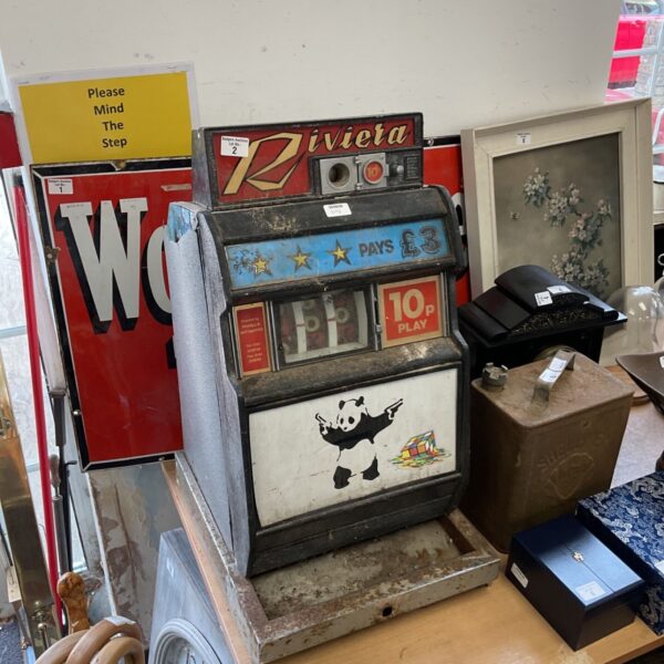 Vintage Riviera one armed bandit slot machine needing restoration.