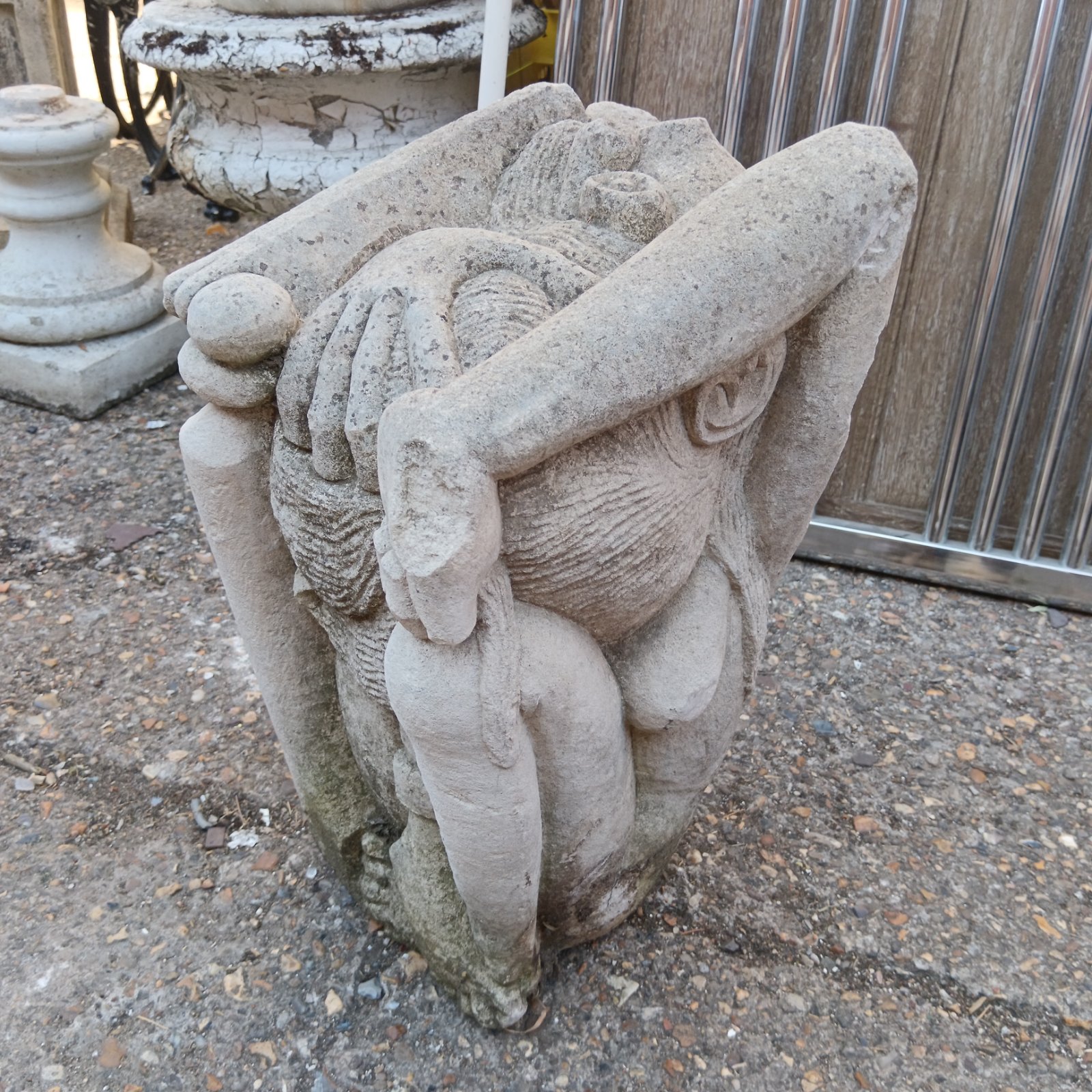 Close-up of the Romeda Princess sculpture showing detailed stone work.