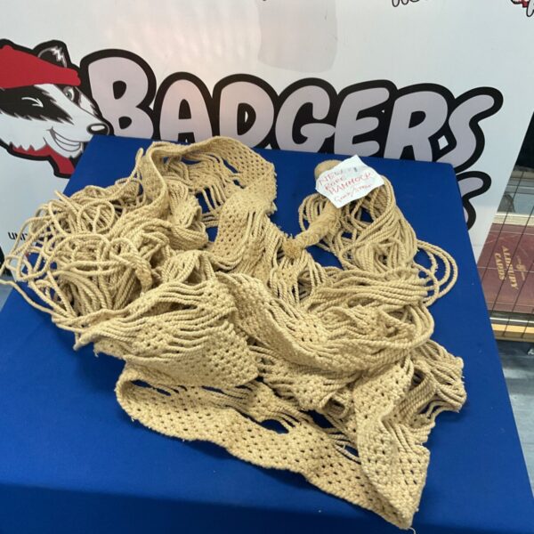New woven rope hammock, ideal for outdoor relaxation and garden decor.