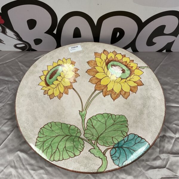 Vintage Rosenthal sunflower plate with detailed floral design.