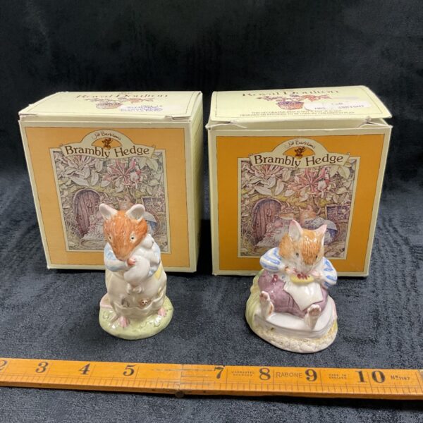 Royal Doulton Brambly Hedge Dusty figurine with babies, detailed porcelain.