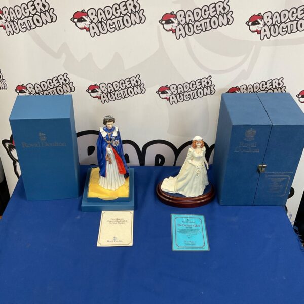 Royal Doulton Queen Elizabeth II and Duchess of York figurines with boxes.