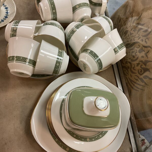 Royal Doulton Rondelay teaset with floral pattern and gilded edges.