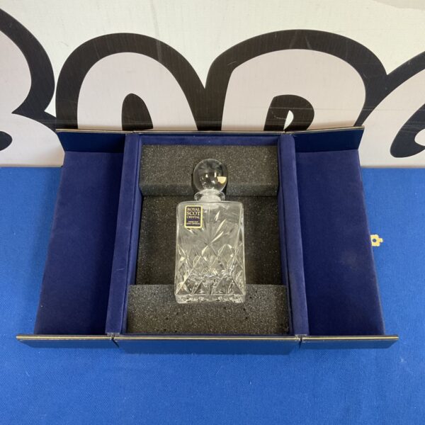 Royal Scot Crystal miniature decanter in display case.