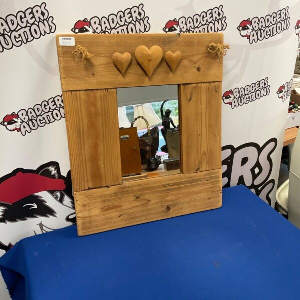 Rustic pine heart mirror for farmhouse style decor.