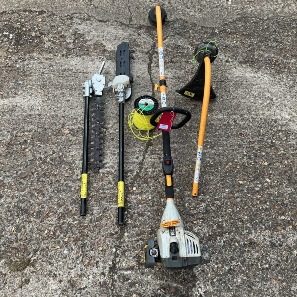 Ryobi split shaft trimmer with attachments for garden maintenance.