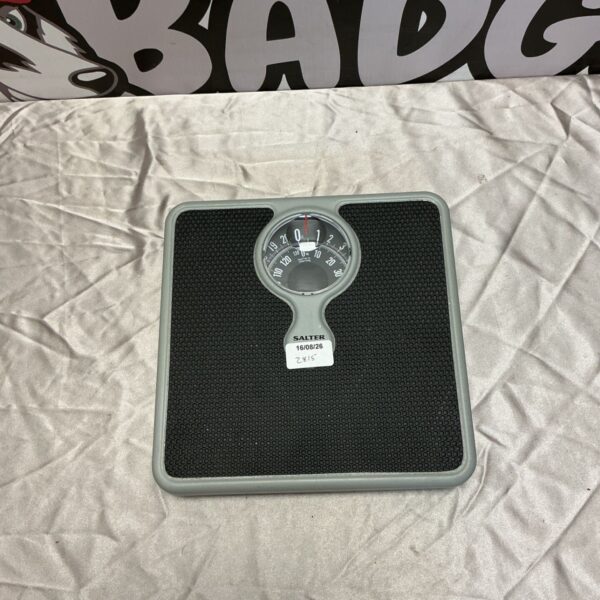 Vintage Salter bathroom scales with circular dial.