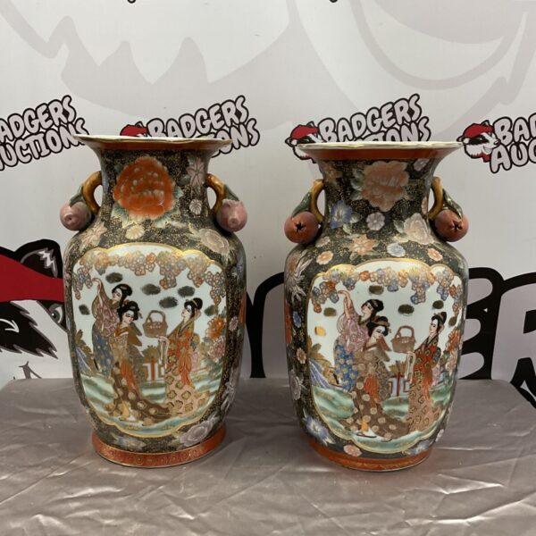 Pair of antique Japanese Satsuma Kutani vases with figural scenes.
