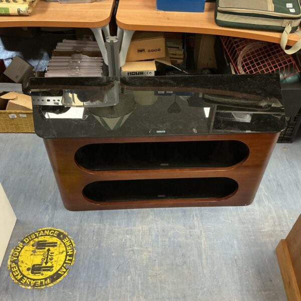 Modern Scandinavian TV cabinet with a glass top and minimalist design.