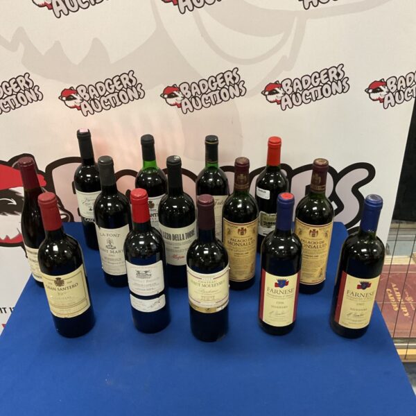 Sealed wine collection including Gevrey Chambertin and La Font Saint Martin bottles.