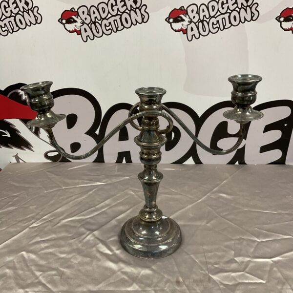 Antique Sheffield silver plate tri-head candelabra for elegant lighting.
