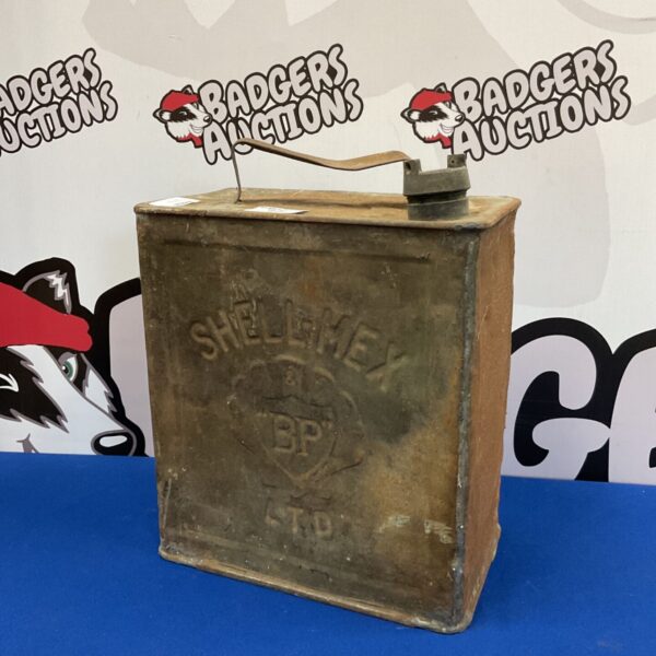 Vintage Shell Mex fuel can with BP logo, showing wear.