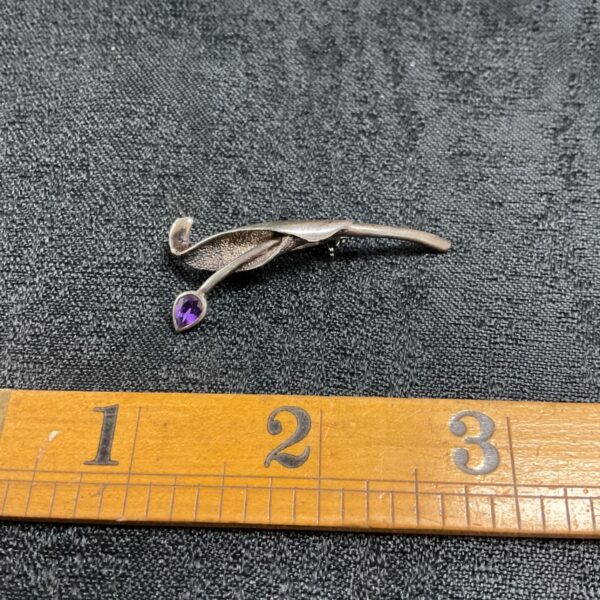Vintage silver brooch with amethyst tulip flower.