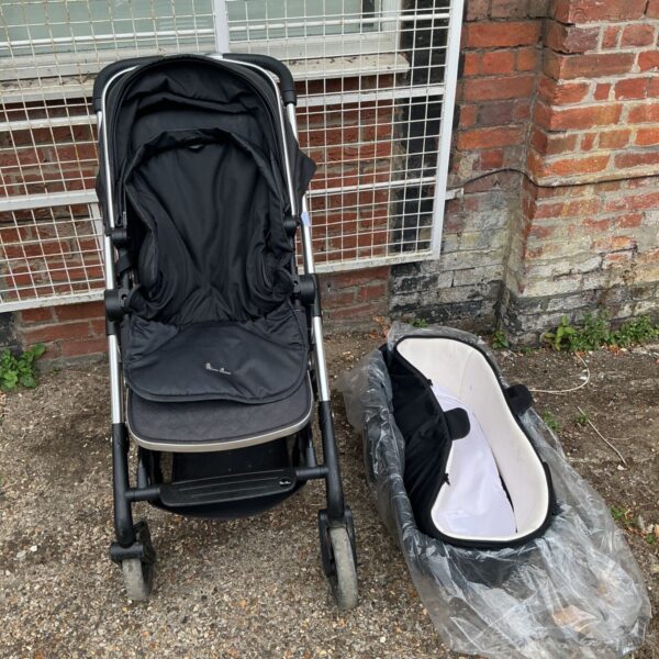 Black Silver Cross Wayfarer pushchair with silver chassis.