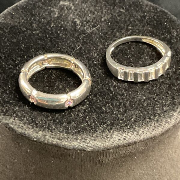 Silver rings with pink and white CZ stones, sizes M and N.