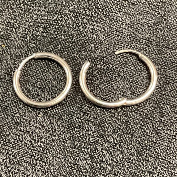 Pair of small 925 silver hoop earrings, minimalist jewellery.