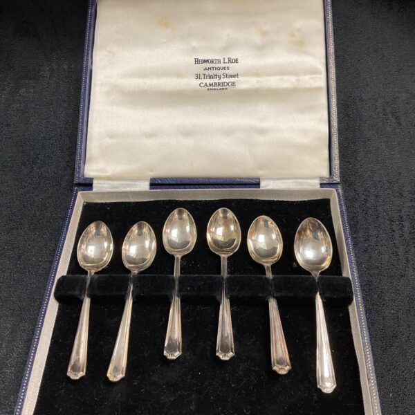 Boxed set of six antique silver teaspoons with hallmarked silver.