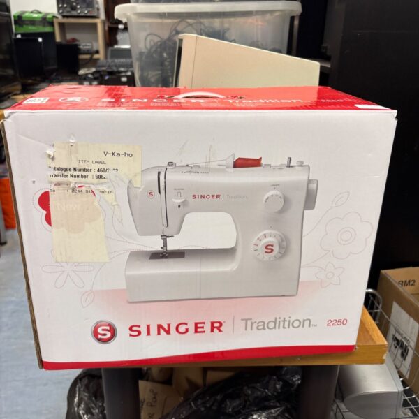 Boxed Singer Tradition 2250 sewing machine in original packaging.