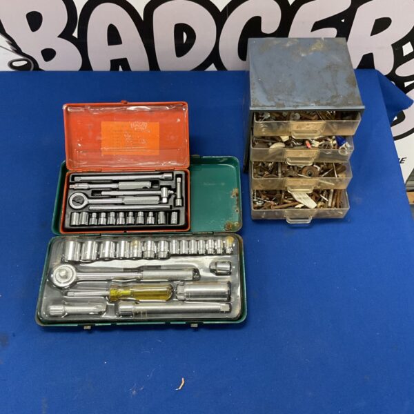 Vintage socket wrench set and metal storage box filled with hardware.