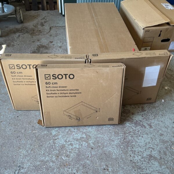 Stack of three boxes containing 60cm soft close drawer slides.