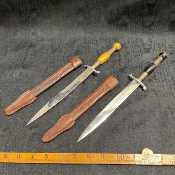 Antique Solingen daggers with leather scabbards, Brazilian export knives.
