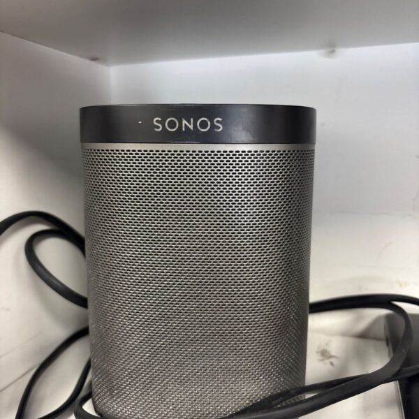 Grey Sonos Play 1 smart speaker with power cable.
