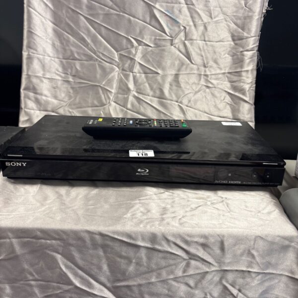 Black Sony BDP-S360 Blu-ray player with remote control.