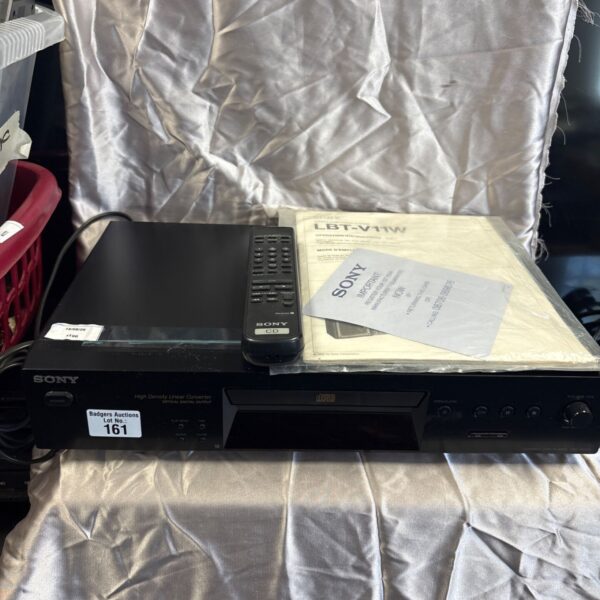 Sony CDP-XE370 compact disc player with remote and manual.