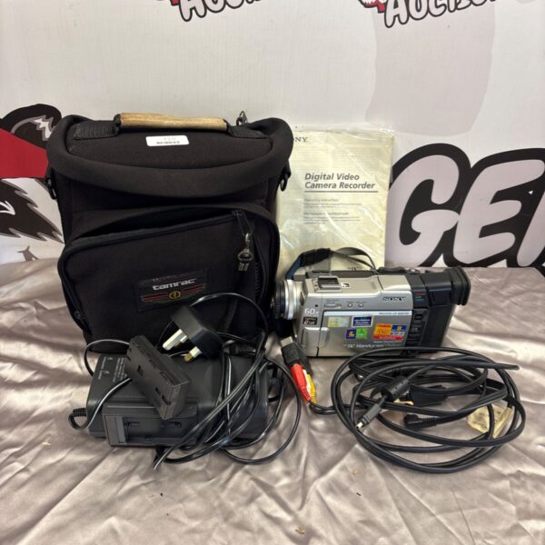 Sony DCR-TRV9E digital camcorder with carrying case, vintage video camera.