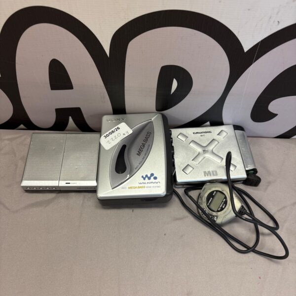 Vintage Sony Walkman, Grundig and Panasonic portable audio players.