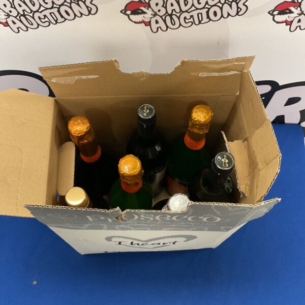 Assorted sparkling wine lot with Prosecco and other alcoholic beverages.