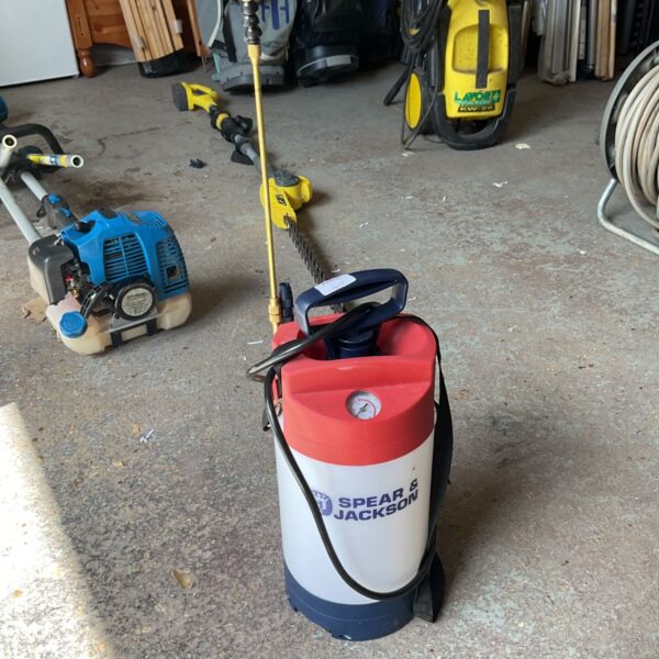 Spear and Jackson pressure sprayer in a garage setting.
