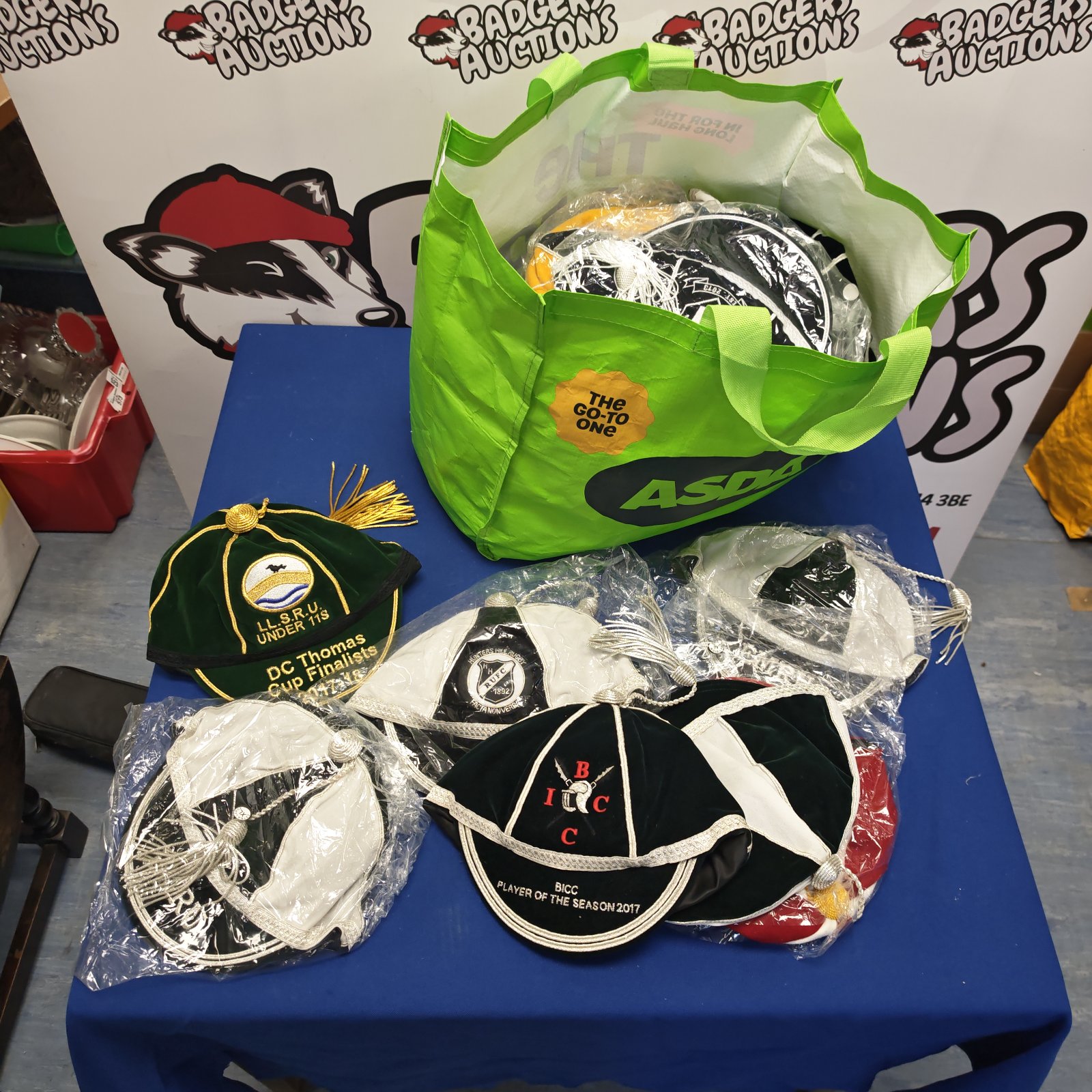 Mixed lot of sporting caps including DC Thomas cup finalists cap.