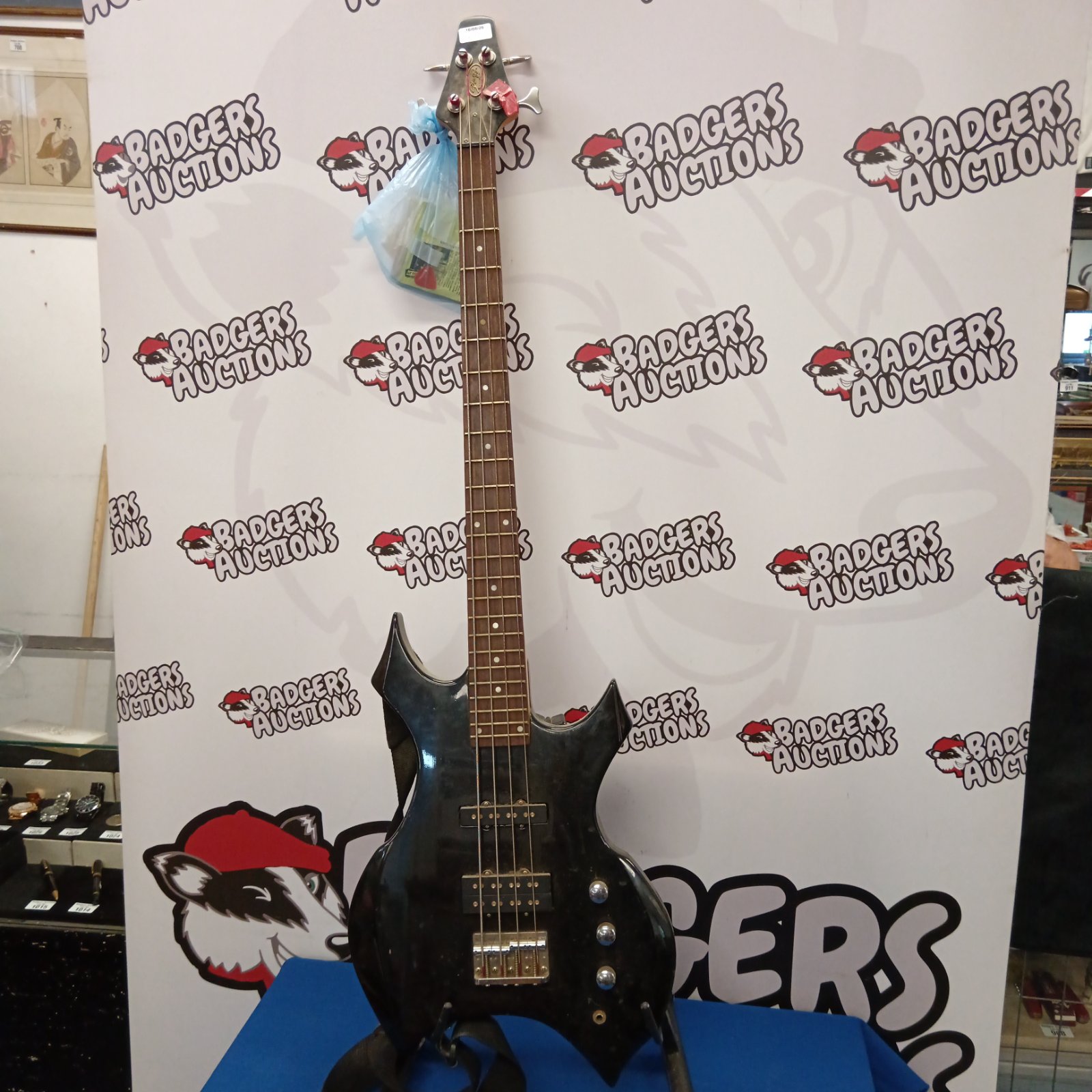 Black Stagg Warlock bass guitar, electric musical instrument.