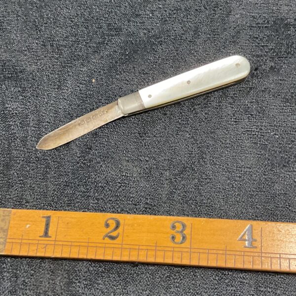 Vintage sterling silver fruit knife with mother of pearl handle.