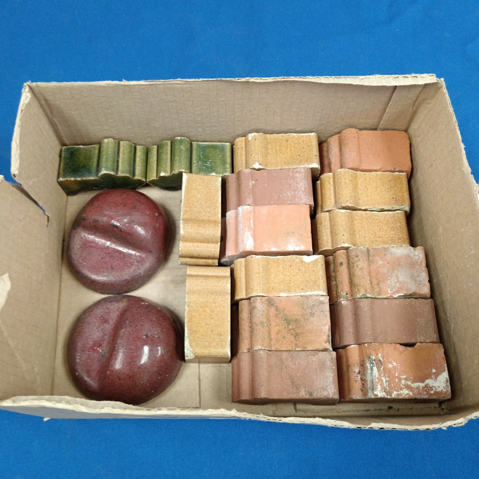 Lot of vintage stoneware plant pot feet for garden planters.