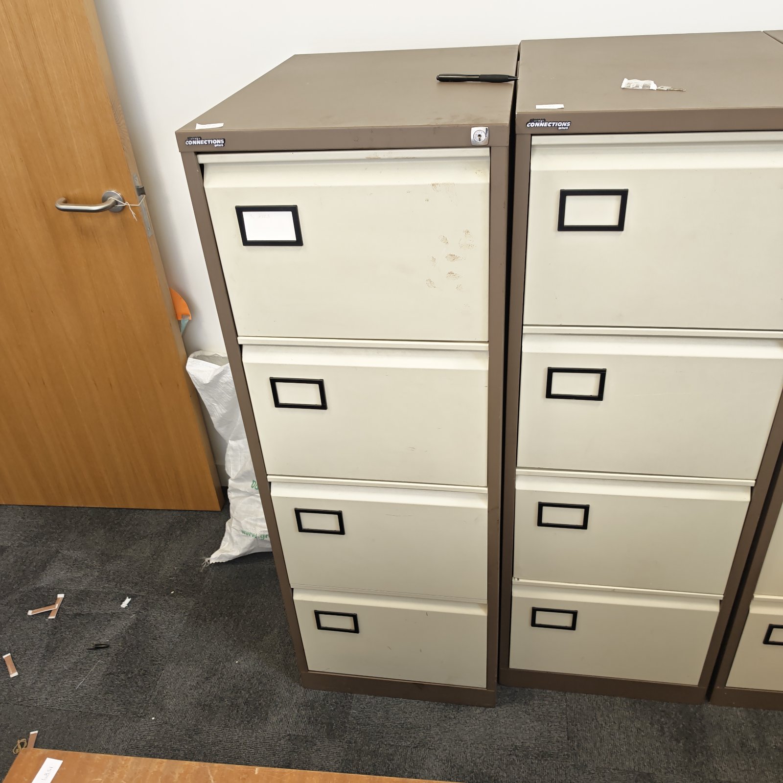 Four-drawer metal filing cabinet from Storage Connections for office storage.