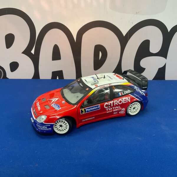 Detailed SunStar Citroen Xoara WRC diecast model car on display.