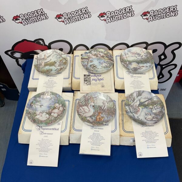 Six Danish porcelain swan collector plates with certificates.
