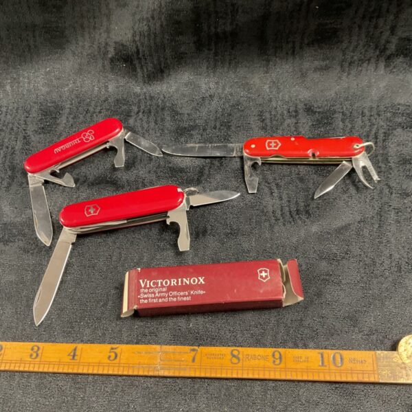 Vintage Swiss Army Knife lot with boxed Officer’s Knife.