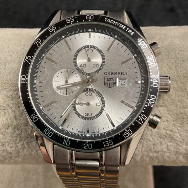 Front view of replica TAG Heuer Carrera quartz watch with silver dial.